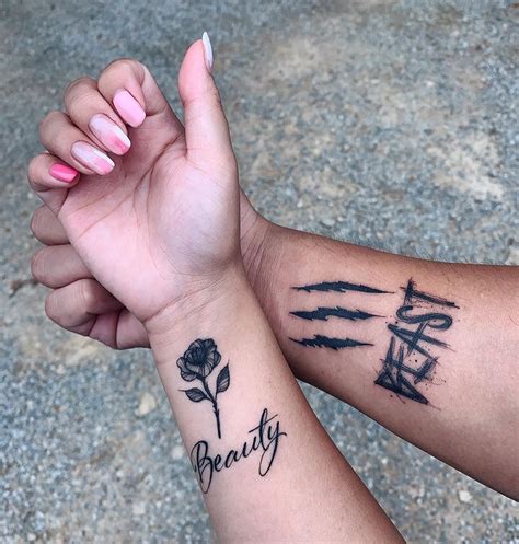 matching black couple tattoos